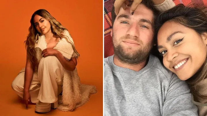 Jessica Mauboy and her husband lying together on a rug