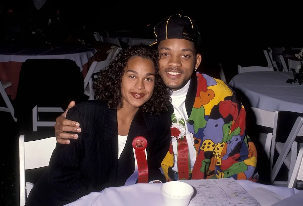 Will Smith and Sheree Zampino sitting next to each other at a table