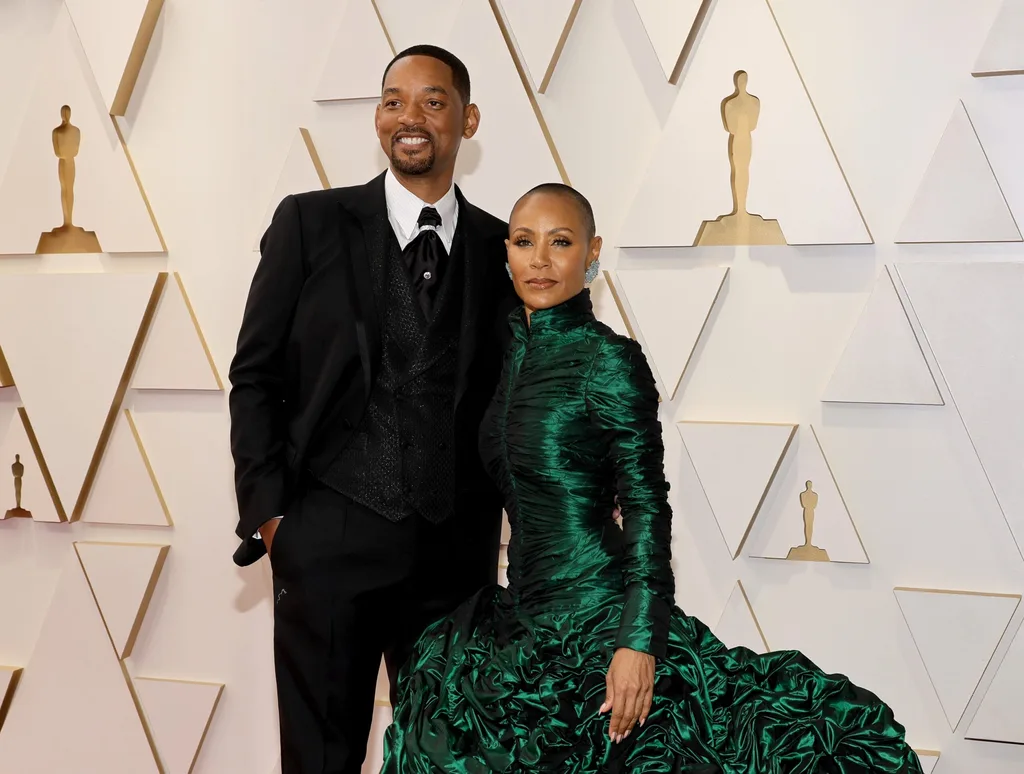 Will and Jada Pinkett Smith with arms around each other