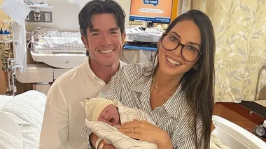 Olivia Munn and John Mulaney with their daughter.