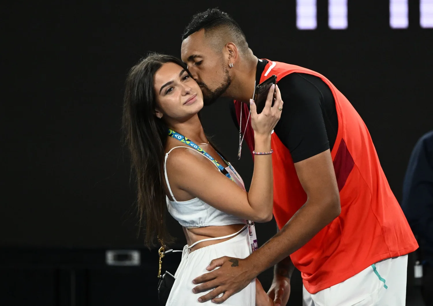Nick Kyrgios kisses Costeen on court