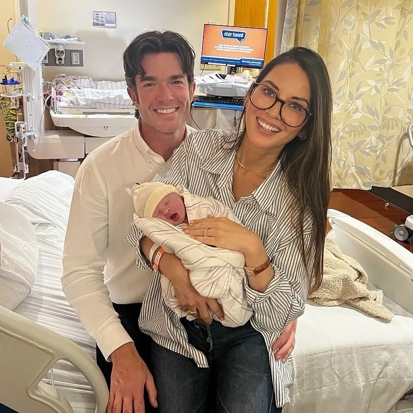 Olivia Munn and John Mulaney with their daughter