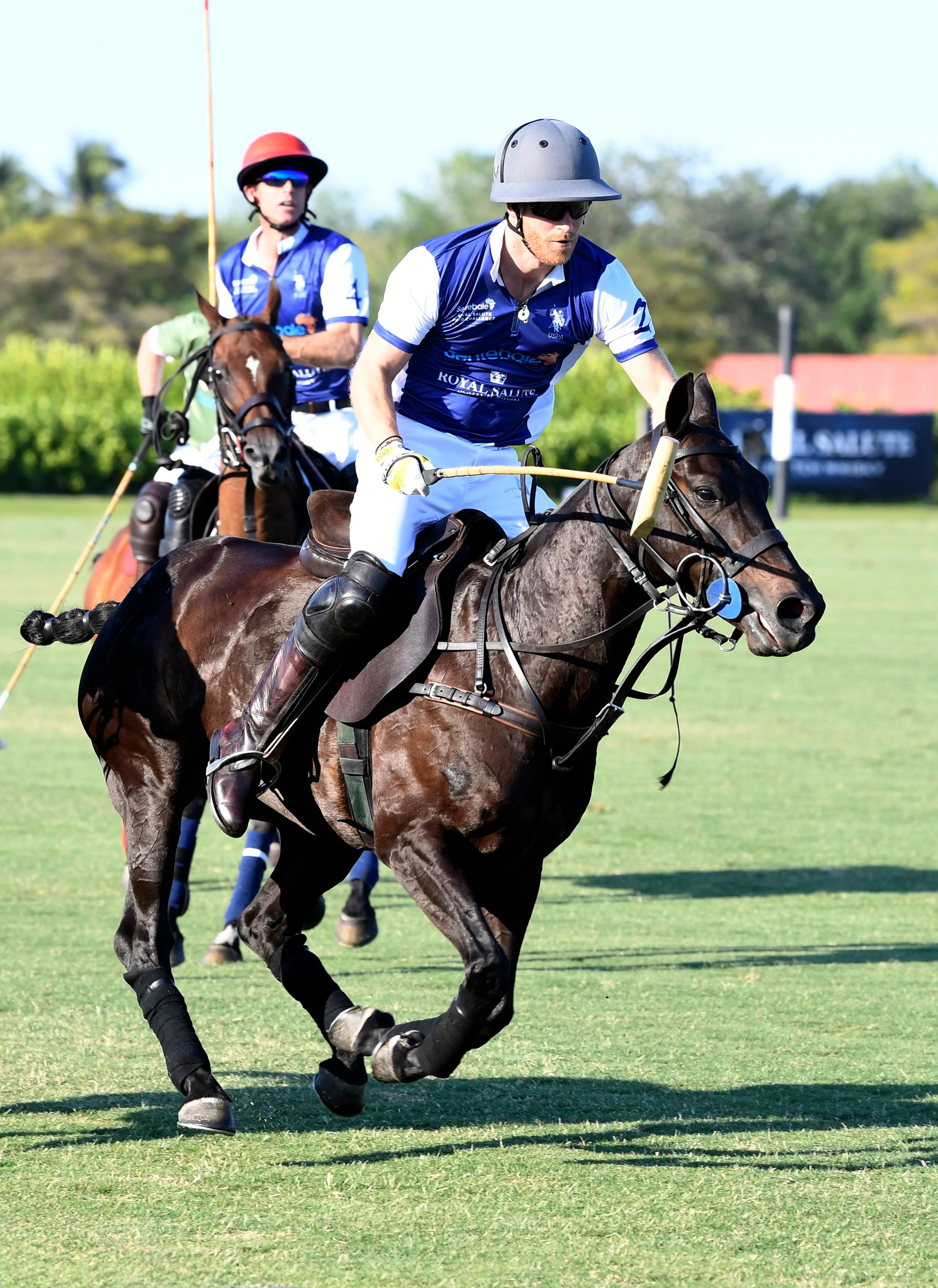 Prince Harry playing polo