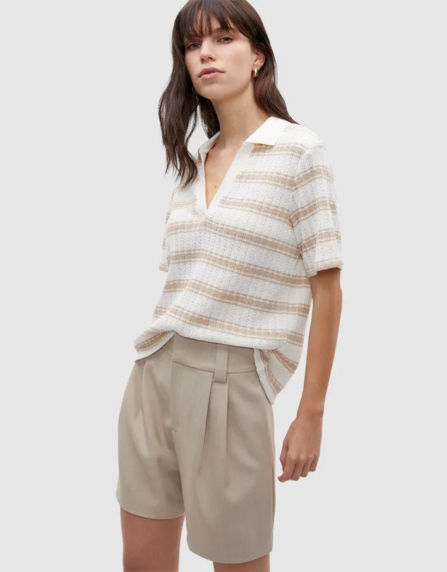 Model wearing Seed striped polo top