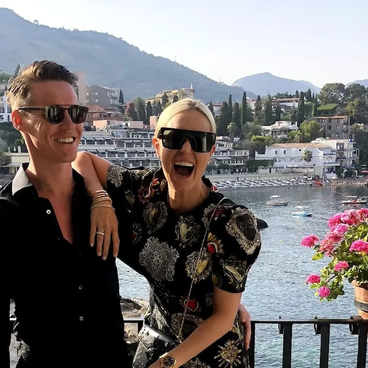 Oliver Curtis and Roxy Jacenko laughing