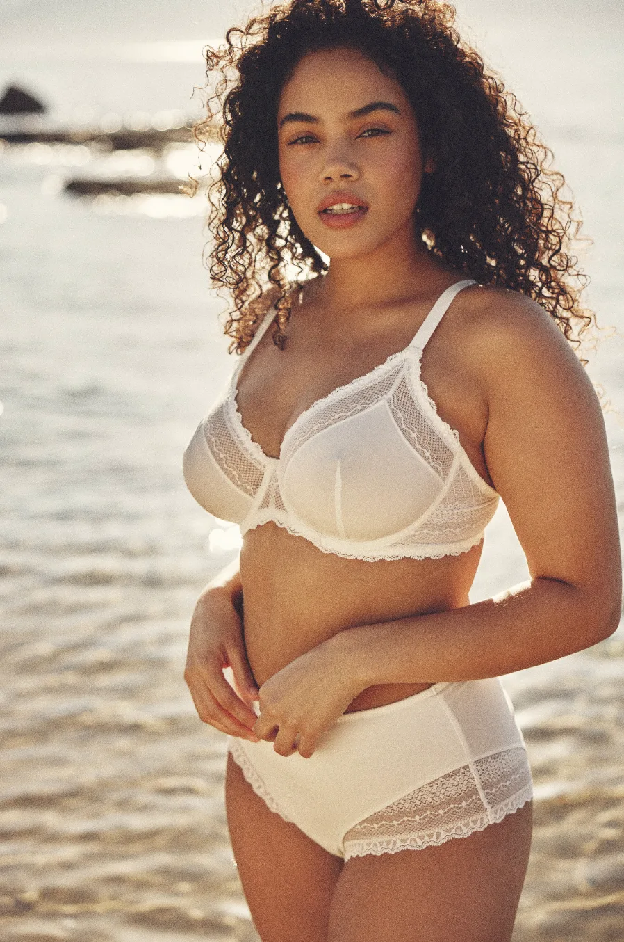 A model with a larger bust wears the range