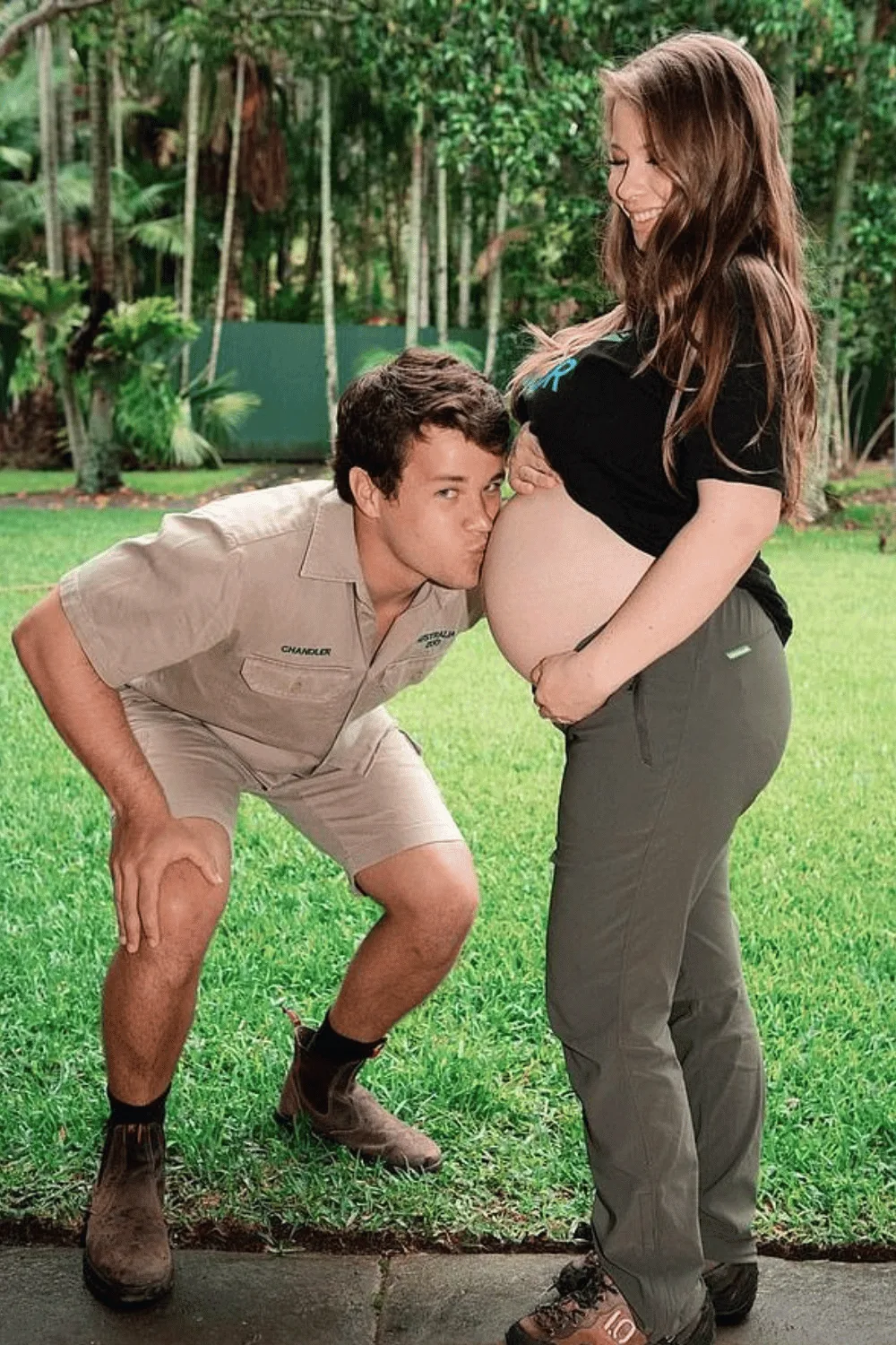 Chandler Powell kissing Bindi Irwin's stomach while she is pregnant.