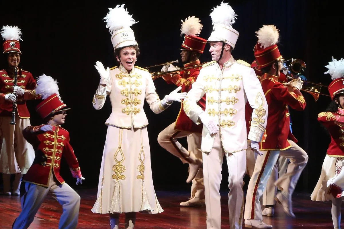 Hugh Jackman and Sutton Foster perform onstage during the opening night curtain call for The Music Man in 2022.