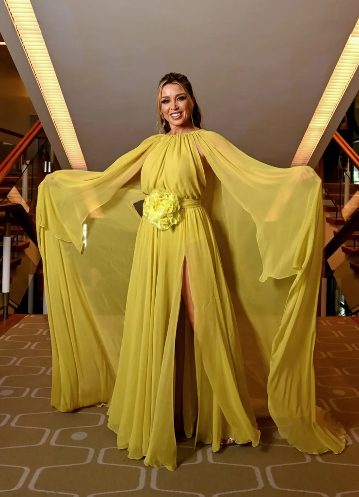Dannii Minogue in a yellow dress