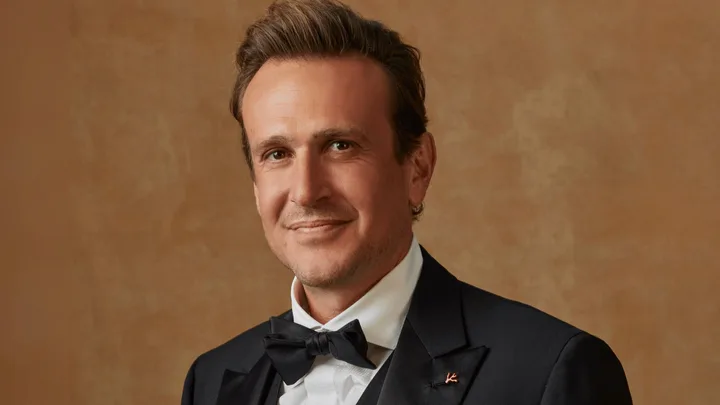 Jason Segel dressed in a tuxedo and black bow tie