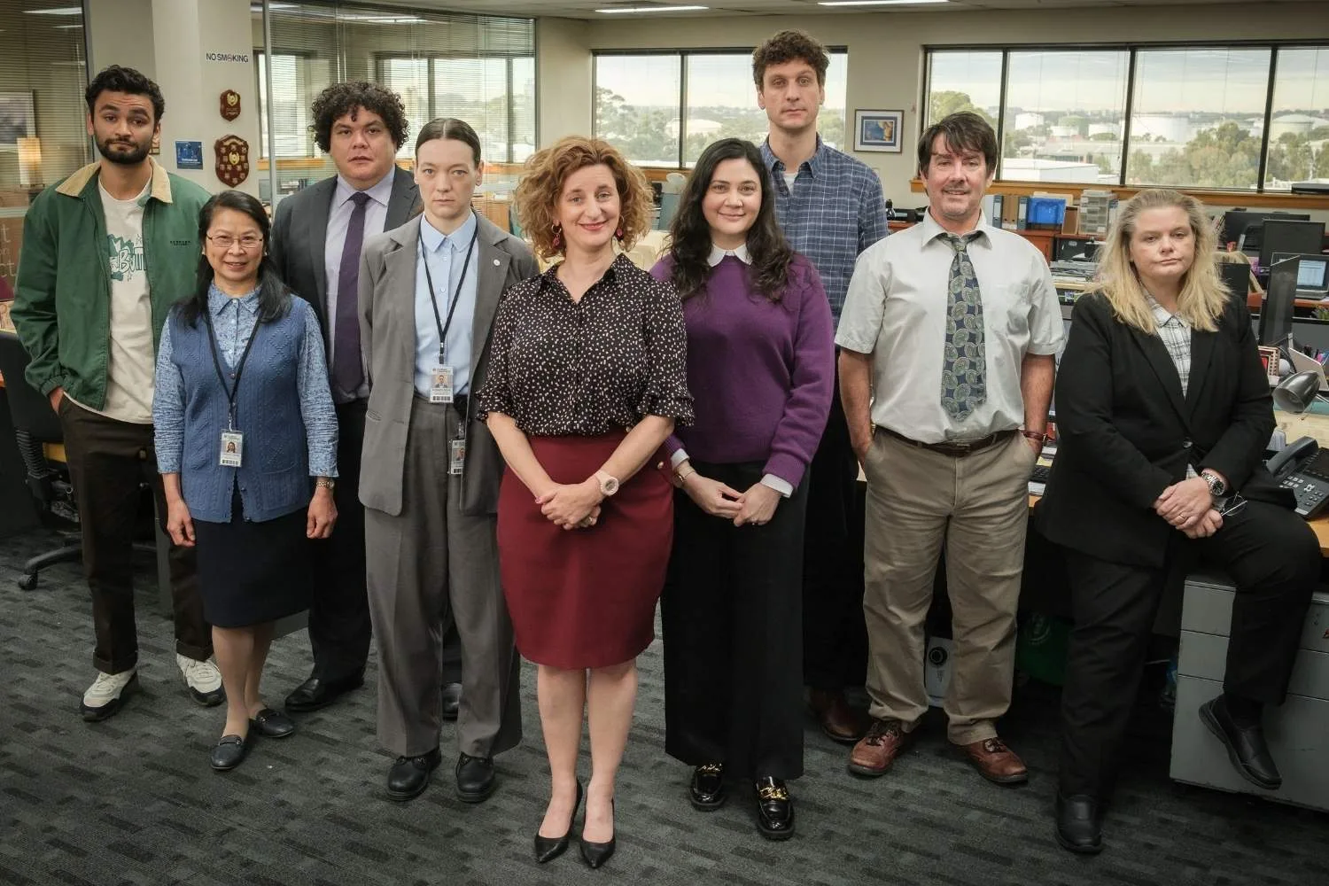 Sebastian Roy, Susan Ling Young, Josh Thomson, Edith Poor, Felicity Ward, Shari Sebbens, Steen Raskopoulos, Jonny Brugh, Lucy Schmidt in character in a scene from The Office