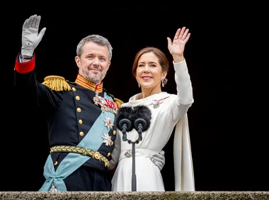 Fred and Mary appear on palace balcony following his proclamation ceremony