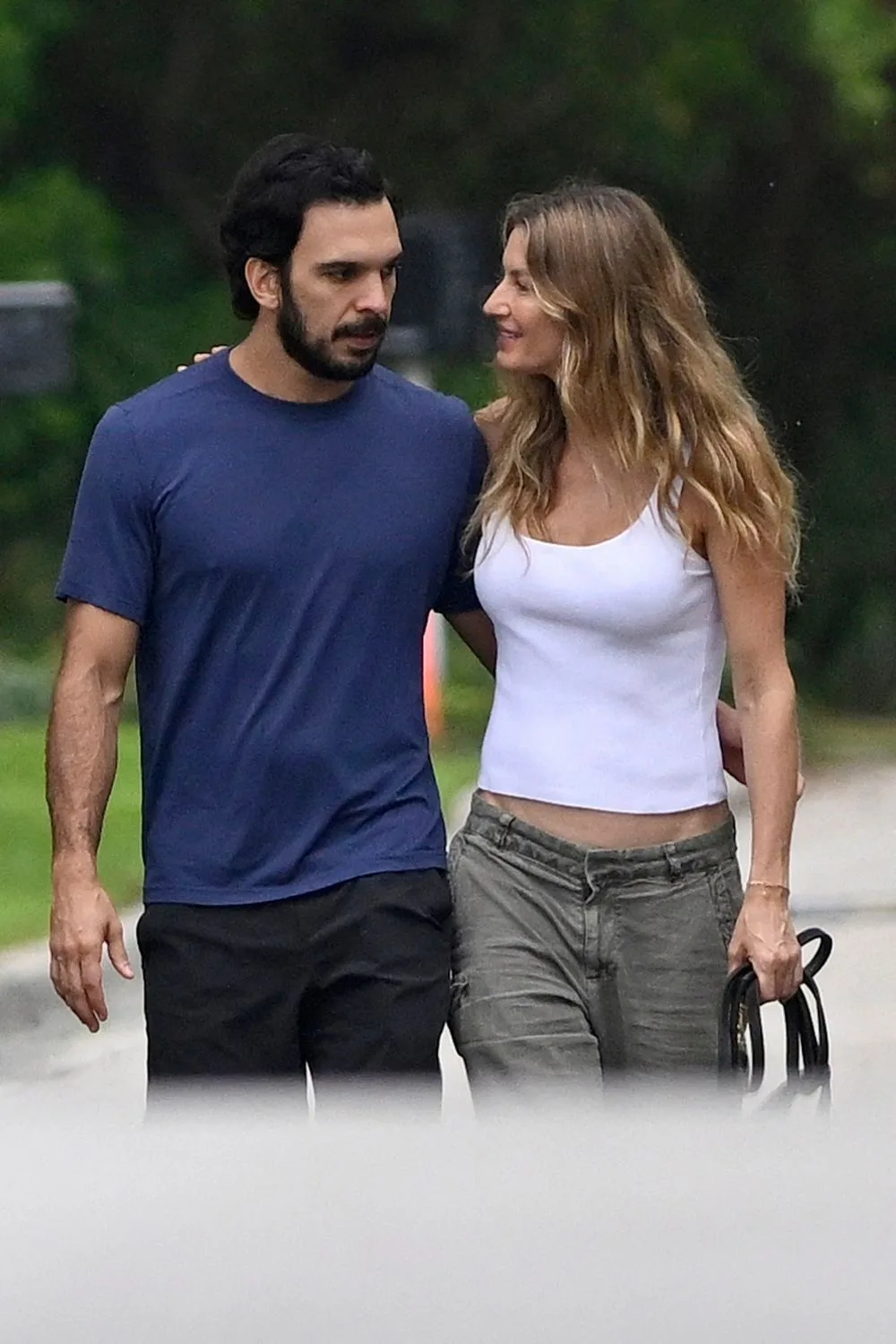 Gisele Bündchen and Joaquim Valente walking