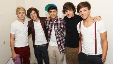 Harry Styles, Liam Payne, Niall Horan, Louis Tomlinson and Zayn Malik of One Direction pose for photographs while visiting Glasgow, Manchester and London on September 11, 2011. The tour was taken in a luxury helicopter to launch their first single 'What Makes You Beautiful' released on the 12th September.