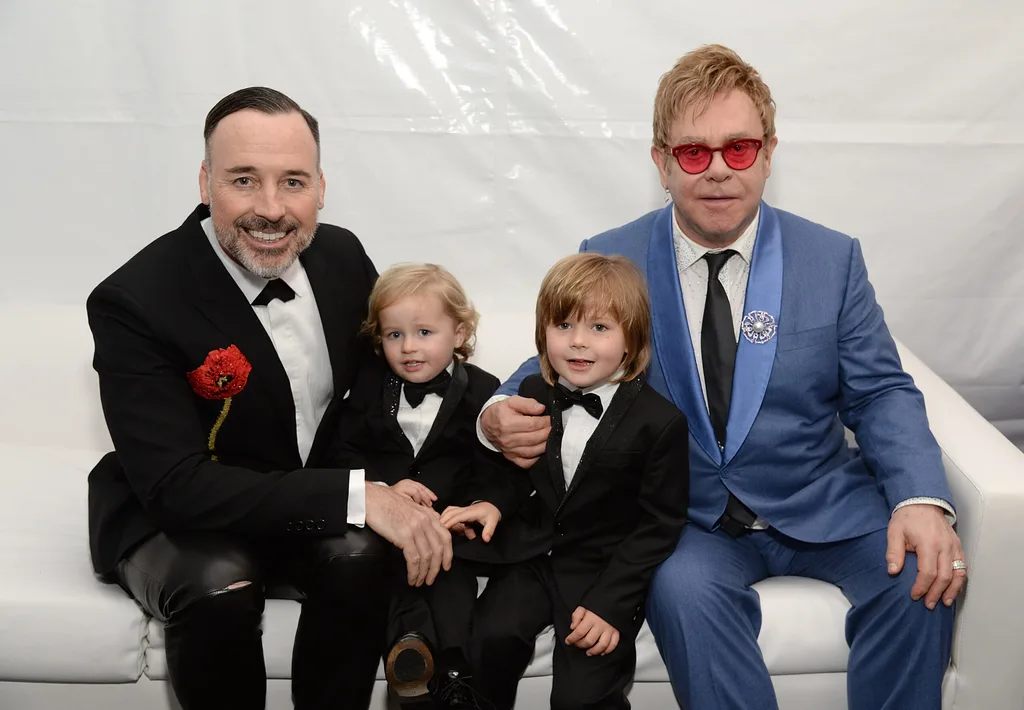 David Furnish, Elijah Furnish-John, Zachary Furnish-John, and Sir Elton John attend the 23rd Annual Elton John AIDS Foundation Academy Awards Viewing Party on February 22, 2015