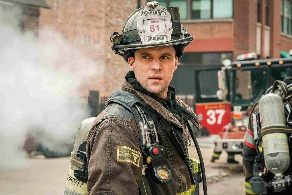 Jesse Spencer wears firefighting uniform in a scene from Chicago Fire