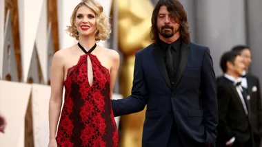 Dave Grohl posing with wife Jordyn Blum