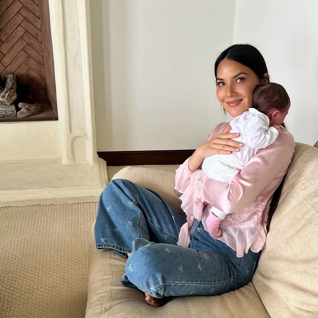 Olivia Munn holding baby Méi