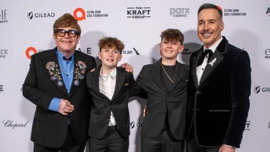 British singer-songwriter Elton John and his partner David Furnins pose with their sons Zachary Jackson Furnish and Elijah Joseph Daniel Furnish as they attend the 33rd Annual Elton John AIDS Foundation Academy awards viewing party at the Pacific Design Center in West Hollywood, California, on March 2, 2025