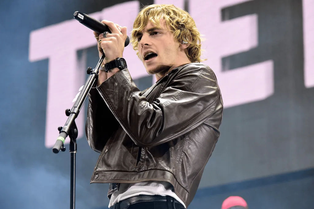 Ross Lynch performing on stage.