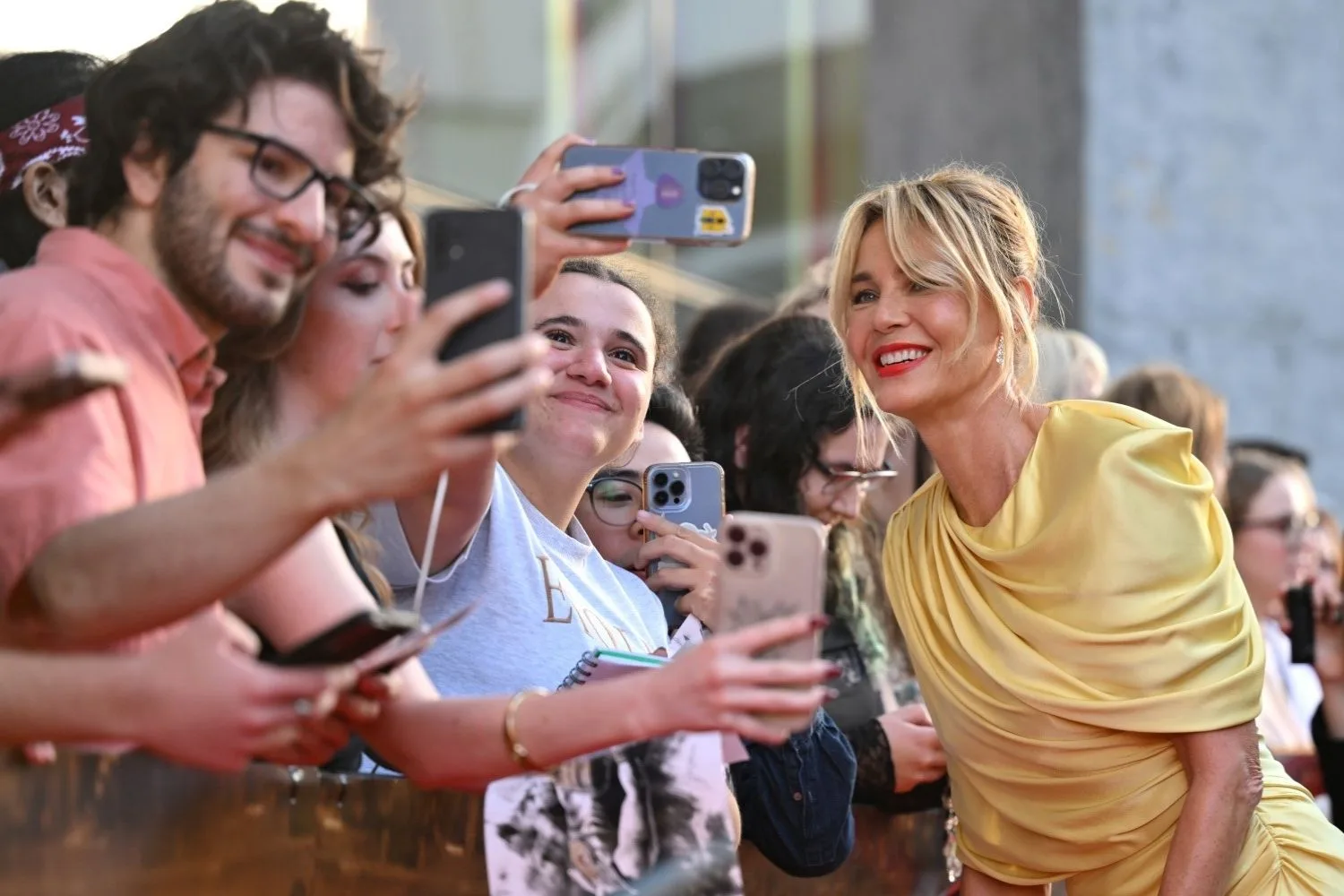 Connie Nielsen takes a selfie with a fan at the Sydney premiere of Gladiator II