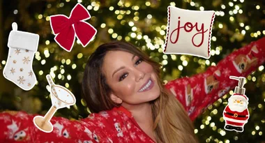 mariah carey surrounded by Christmas decor