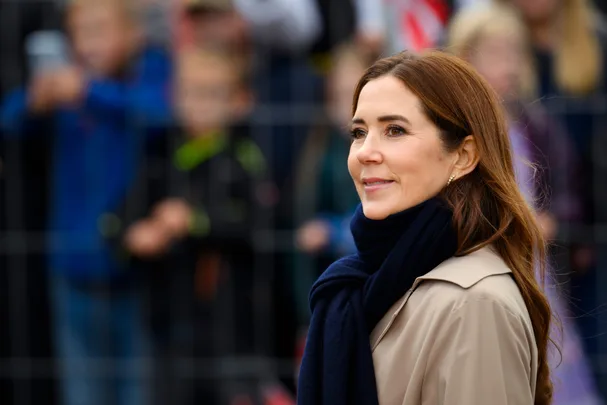 Mary by herself among a crowd