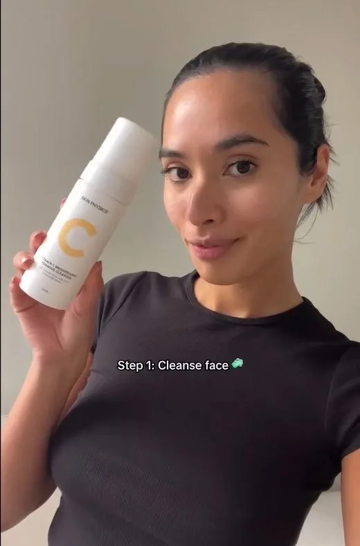 Woman with cleanser