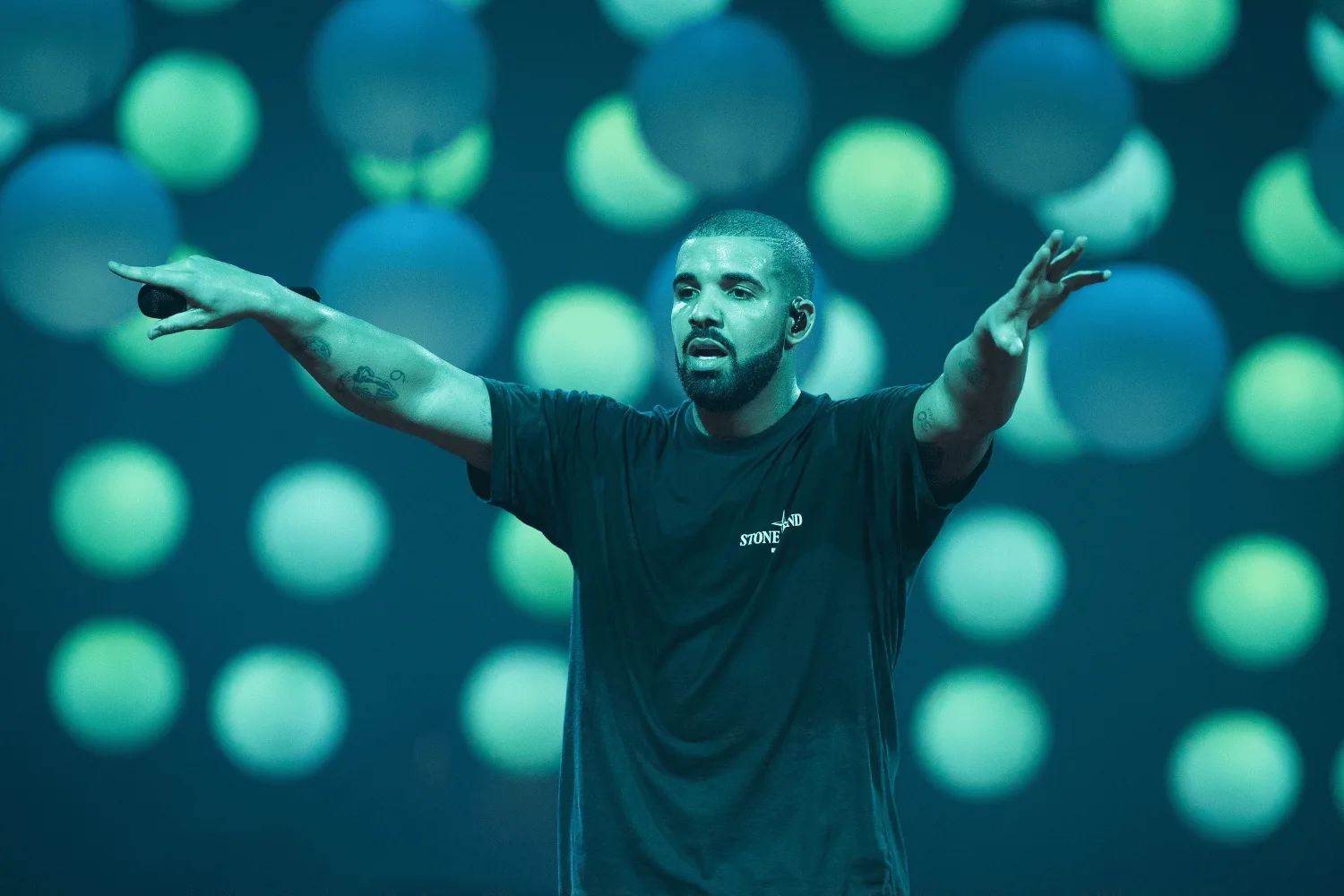 Drake performing on stage