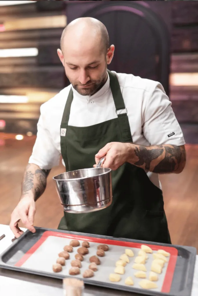 John Demetrios cooking on Dessert Masters. 