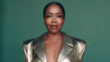 Jessica Frances Dukes wears a silver jacket