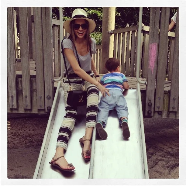 Miranda Kerr on a slide with young son Flynn