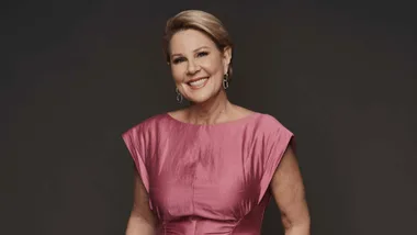 Julia Morris in a pink dress