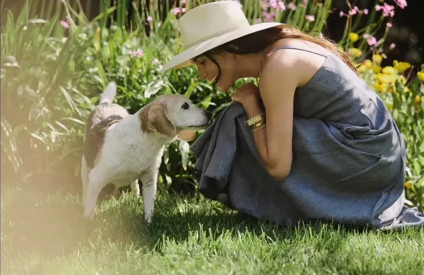 Meghan markle with her late dog Guy