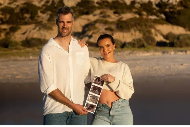 AFLW star Abbey Holmes baby news: “The ultimate teammate is joining us!”