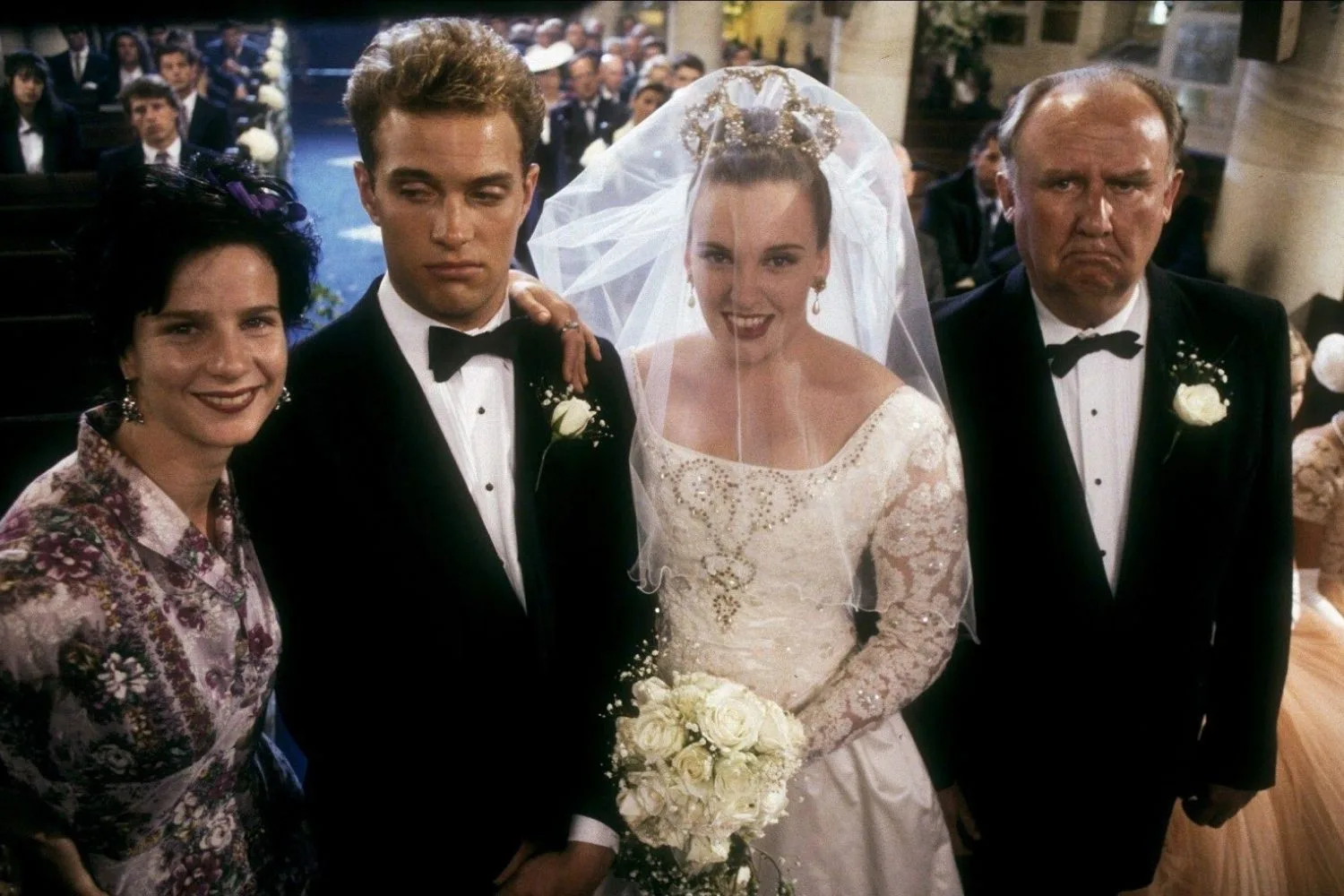 Rachel Griffiths poses with the cast of Muriel's Wedding 