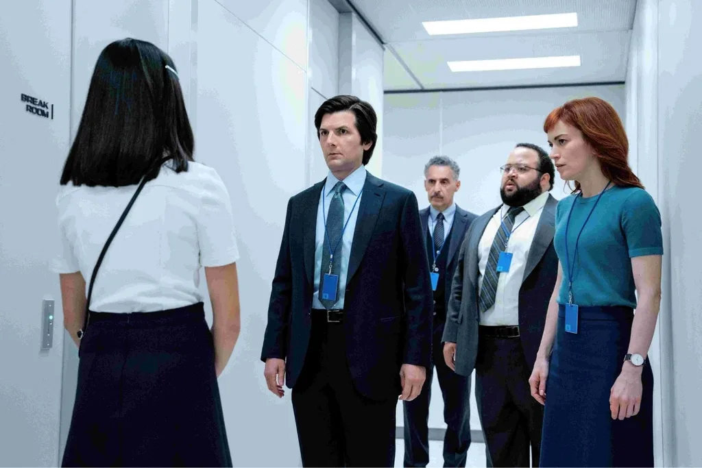 Office workers in a scene from Severance