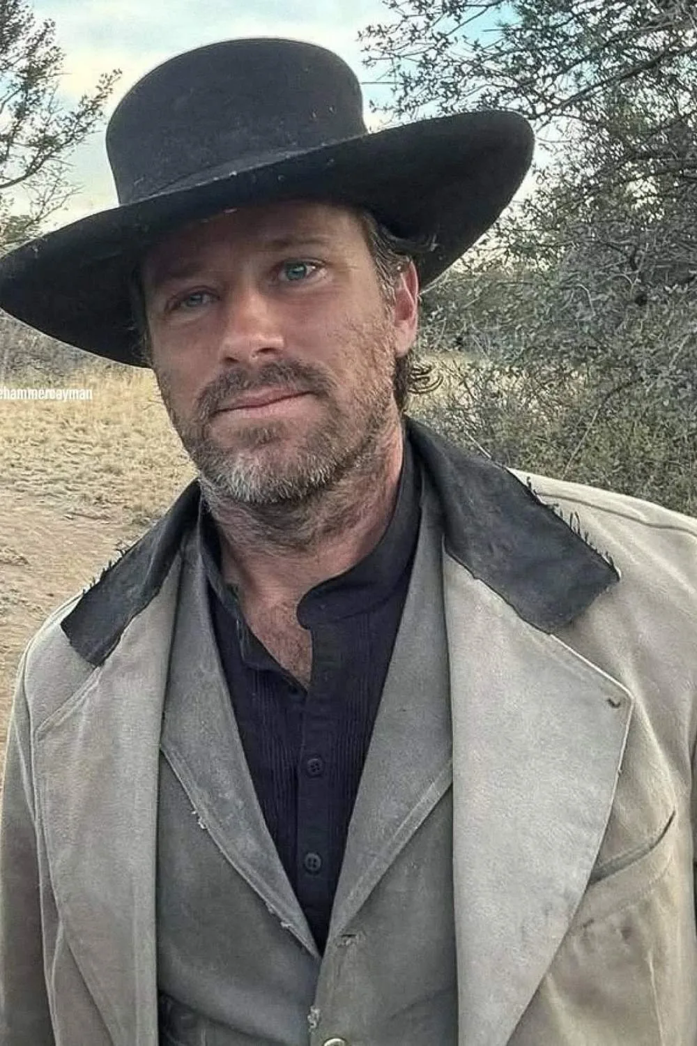 Armie Hammer wears black hat filming Frontier Crucible