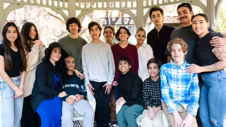 Natalie Suleman poses with all of he children ahead of the premiere of a lifetime movie based on their life
