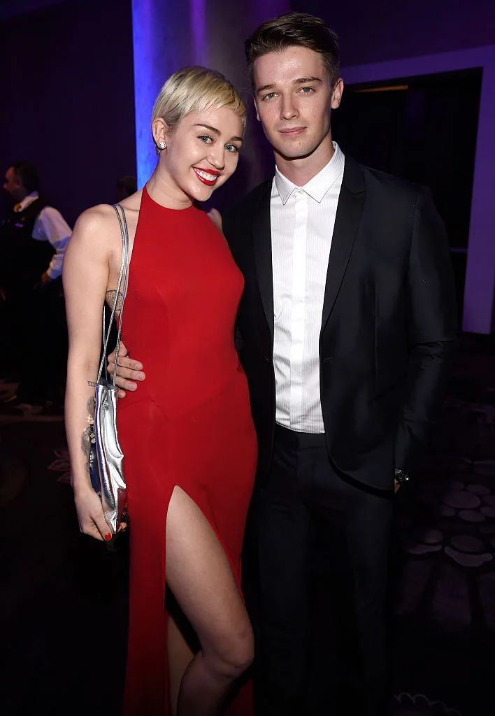 Miley Cyrus and Patrick Schwarzenegger attend the Pre-GRAMMY Gala