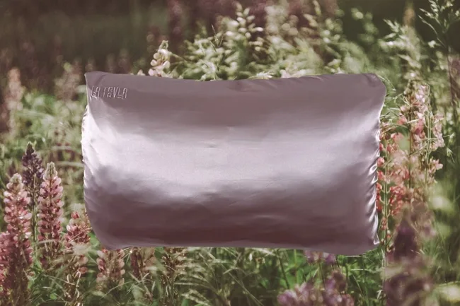 Pink silk pillow travel accessory