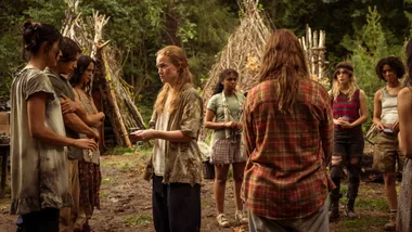 Alexa Barajas as Teen Mari, Kevin Alves as Teen Travis, Courtney Eaton as Teen Lottie, Liv Hewson as Teen Van, Silvana Estifanos as Teen Britt, Sophie Thatcher as Teen Natalie and Jasmin Savoy Brown as Teen Taissa in Yellowjackets, episode 5, season 3.