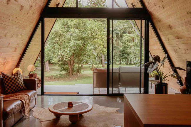 Acute Abode Tiny Home living area looking out onto grass