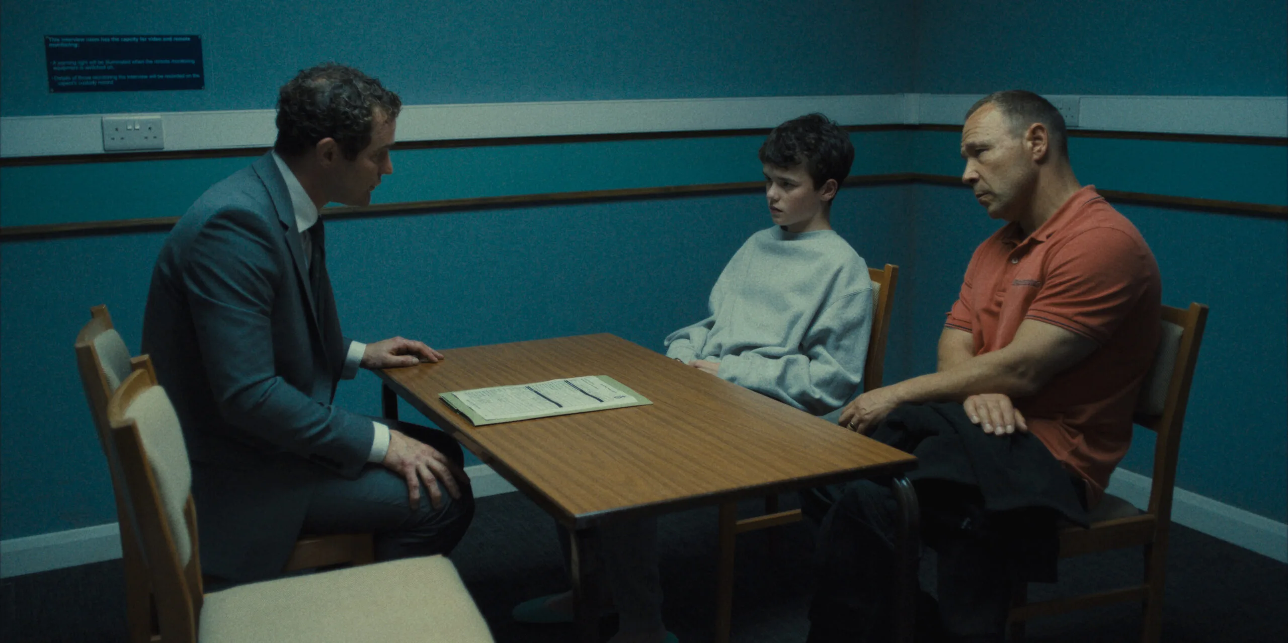 Mark Stanley as Paulie Miller, Owen Cooper as Jamie Miller, Stephen Graham as Eddie Miller in Adolescence. 