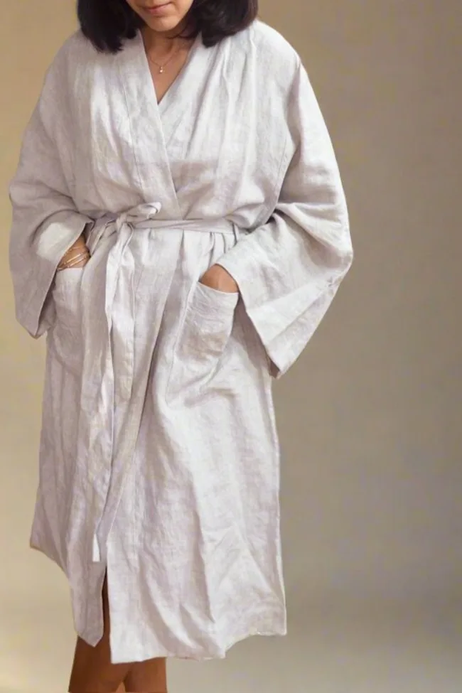 Woman wearing TSL Co while linen robe