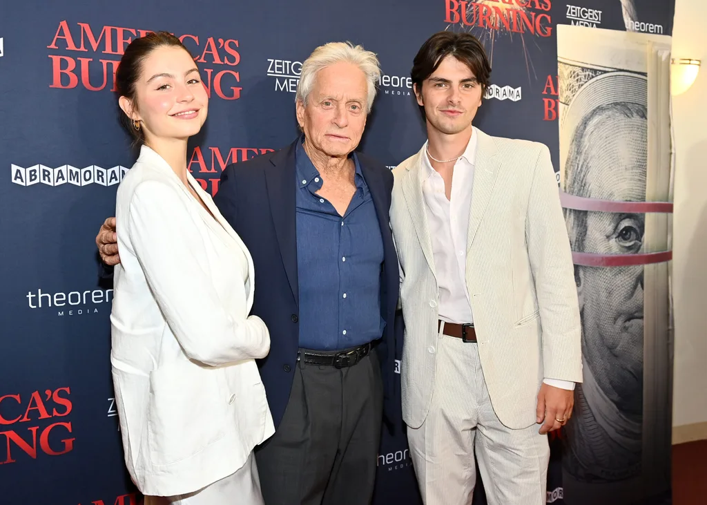 NEW YORK, NEW YORK - JULY 10: (L-R) Carys Zeta Douglas, Michael Douglas and Dylan Douglas attend the NY Special Screening of "America's Burning" at DGA Theater on July 10, 2024 in New York City. (Photo by Roy Rochlin/Getty Images for Abramorama)