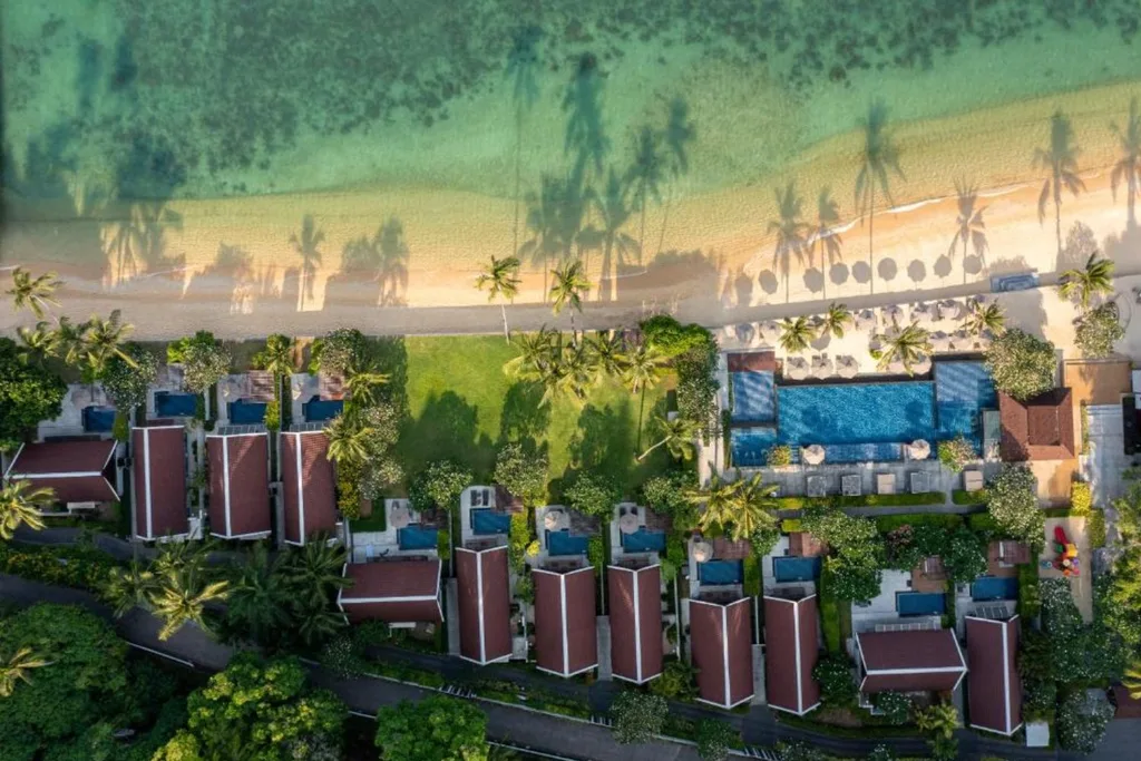 Aerial View of hotel with coastline and .