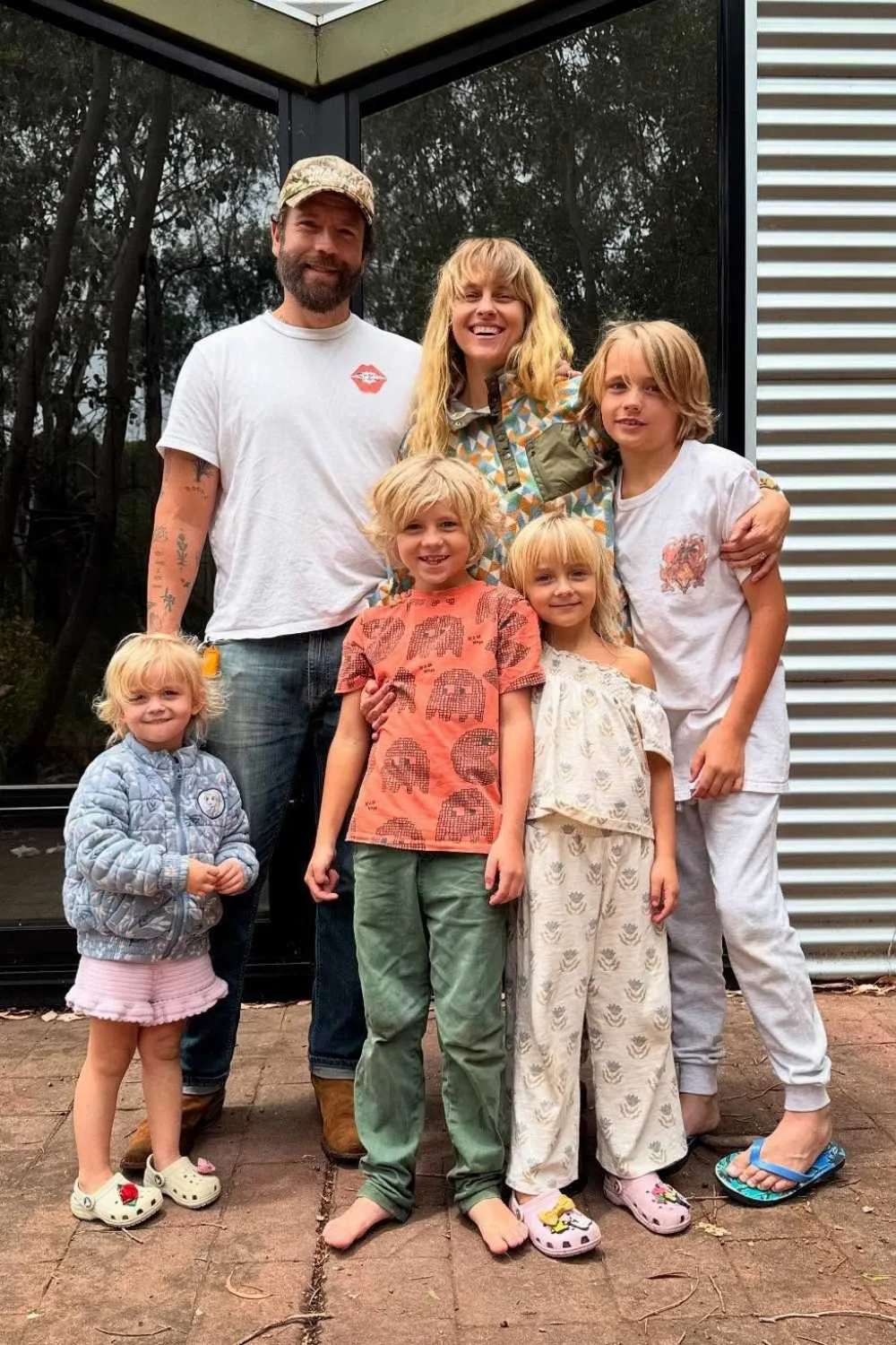 A family photo of Teresa Palmer, husband Mark Webber and their four children