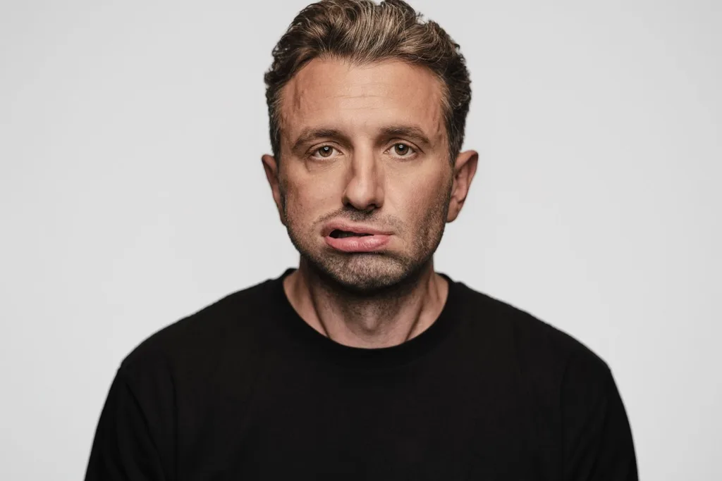 Tommy Little pulling silly face