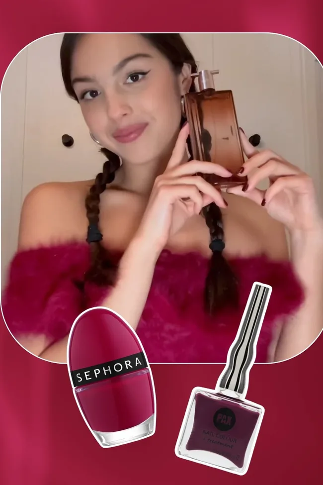 Olivia Rodrigo with maroon nails holding perfume Celeb Nail Trend